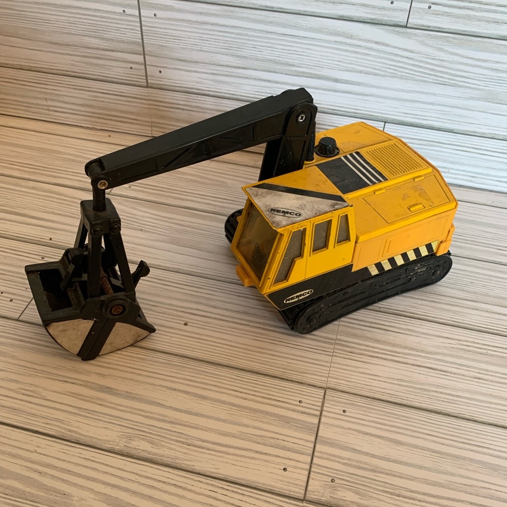 Vintage Remco Yellow Excavator Toy with Black Arm and Treads